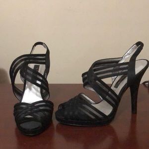 Black strappy heels.